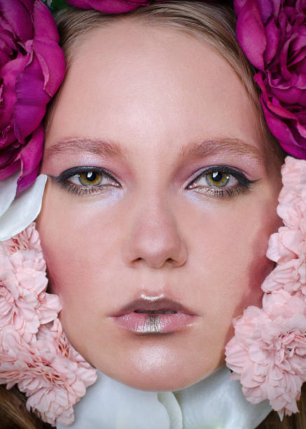 istock A girl in flowers 861983378