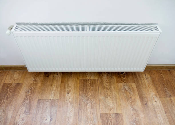 istock Domestic heating radiator on the wall. Selective focus. 861988206