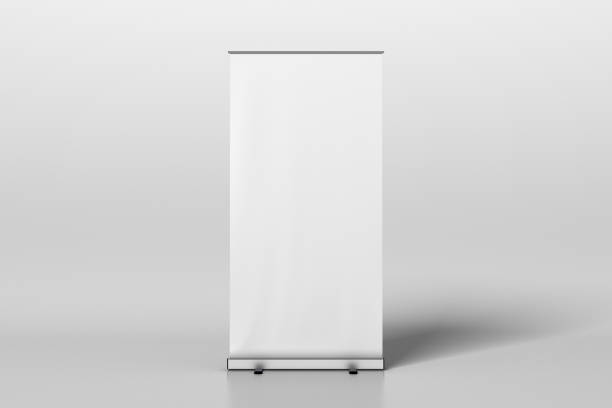 Blank white roll up banner stand Blank roll up banner stand isolated on white. Include clipping path around ad banner. 3d illustration hoisting stock pictures, royalty-free photos & images