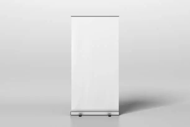 Blank roll up banner stand isolated on white. Include clipping path around ad banner. 3d illustration
