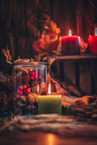 Autumn Decoration Background with Candles, Leafs and Nuts