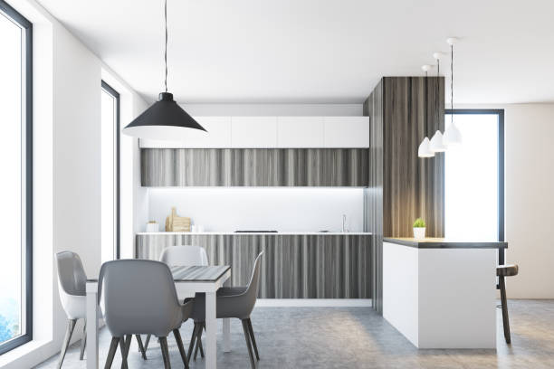 istock Wooden and white kitchen with a bar 862002880