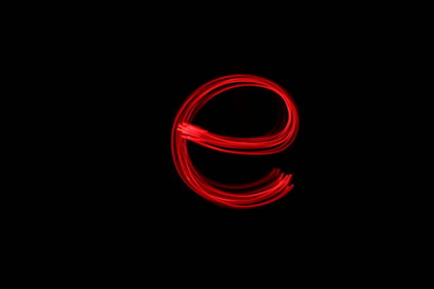 istock Red light painting letter e, long exposure photography against a black background 862002992