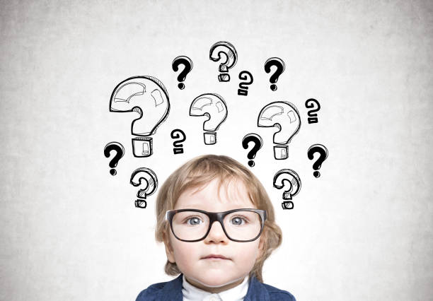 istock Cute baby boy in glasses, many questions 862004026