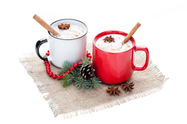 istock eggnog cocktail in mugs arranged with christmas decoration isolated on white background 862010782