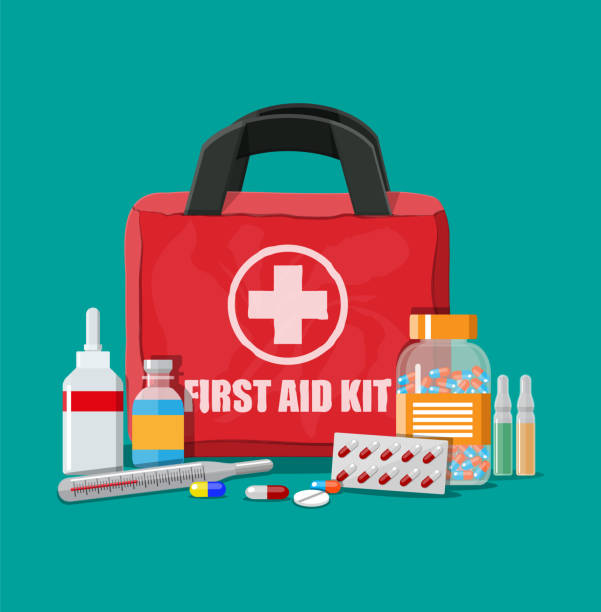 Medical first aid kit with pills and thermometer Medical first aid kit with different pills and thermometer. Healthcare, hospital and medical diagnostics. Urgency and emergency services. Vector illustration in flat style first aid stock illustrations