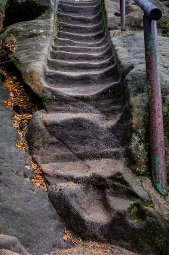 Rocky stairs on an rainy autumn afternoon on a sandstone rock near Jetrichovice, beautiful landscape, mystic trails, Bohemian Switzerland, Czech Republic