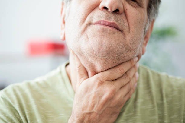istock Old man feeling painful in the throat 862018780