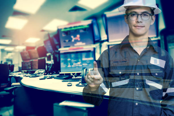istock Double exposure of  Engineer or Technician man in working shirt press his finger for new innovation with group of computers room background, business and industry concept. 862022960