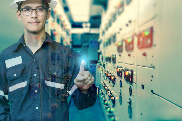 istock Double exposure of  Engineer or Technician man press his finger action in switch gear electrical room of oil and gas platform or plant industrial for monitor process, business and industry concept. 862022966