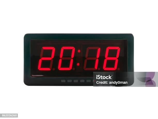 Closeup Red Led Light Illumination Numbers 2018 On Black Digital Electric Alarm Clock Face Isolated On White Background Stock Photo - Download Image Now