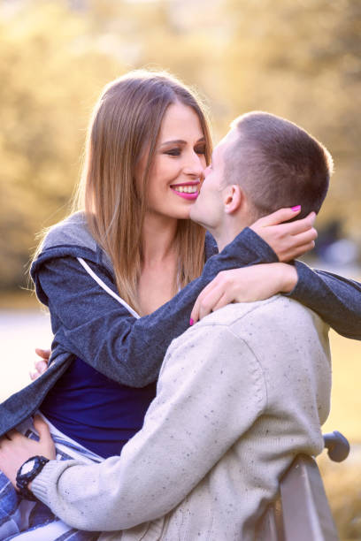 istock Young love couple in park 862033646