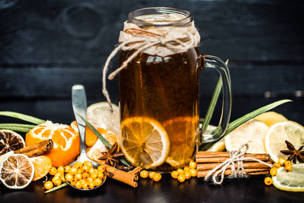 istock the composition of tea with lemon on a black background 862034542