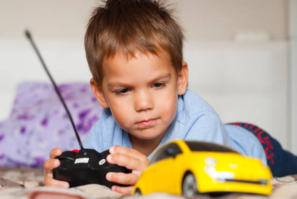 little boy and car stock photo