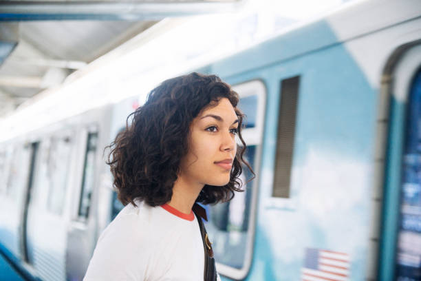 istock American Millennial Hispanic Commuter Waits for Train Chicago Illinois 862037548