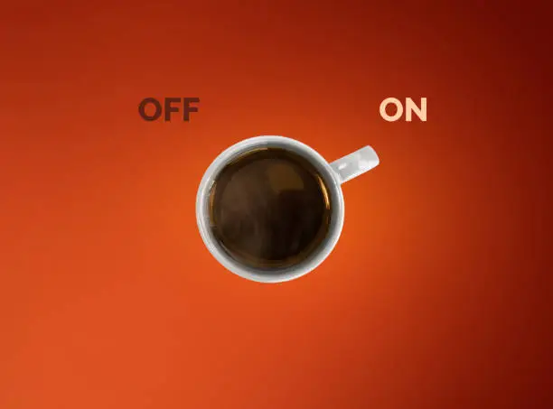 Creative concept of coffe cup. Cup off coffee as a switcher on red background.