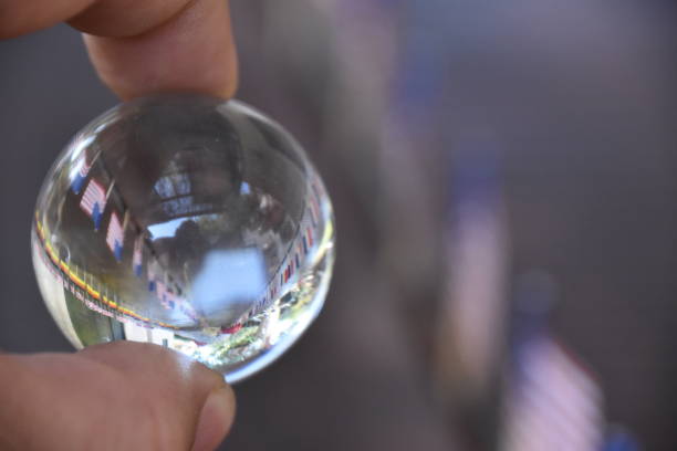 istock International flags and crystal ball 862048474