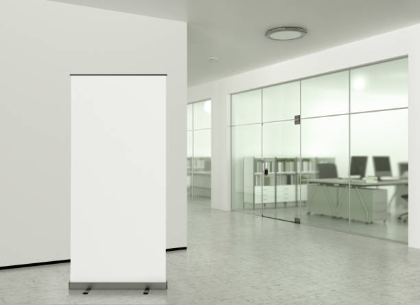 Blank roll up banner stand in modern office