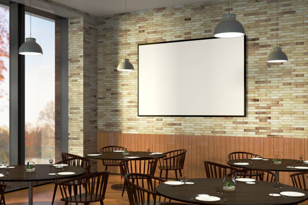 istock Modern restaurant interior with served tables and blank poster 862062484