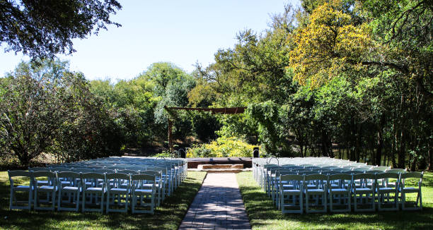 istock outdoor wedding chairs and arbor 862062918