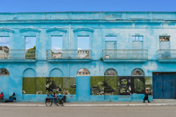 Architecture view with cuban peoples on the street in Santa Clara Cuba - Serie Cuba Reportage stock photo
