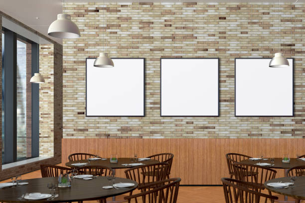 istock Modern restaurant interior with served tables and blank poster 862066414