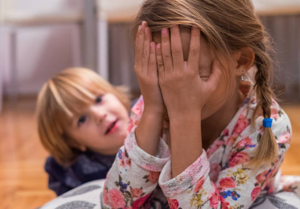 istock Brother look at crying sister 862069250
