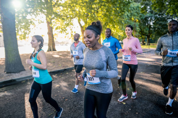 istock Group of people running at marathon 862073208