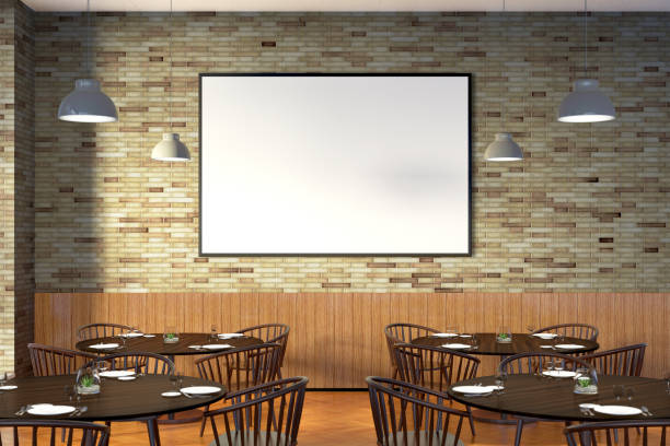 istock Modern restaurant interior with served tables and blank poster 862073308