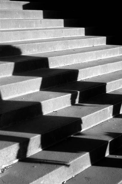 istock Shadows on city stairs 862073642
