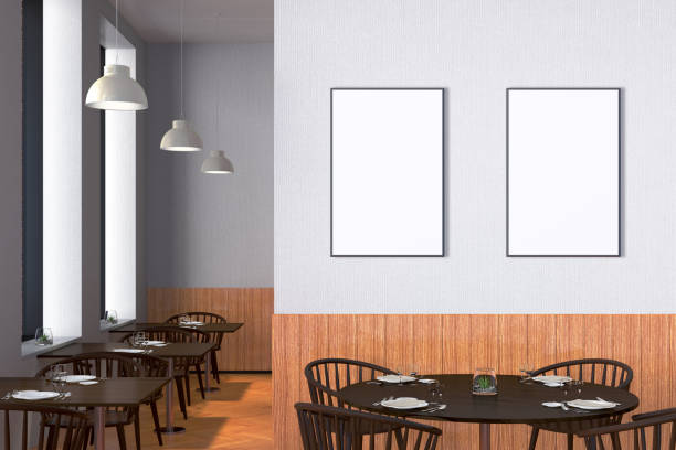 istock Modern restaurant interior with served tables and blank poster 862076120