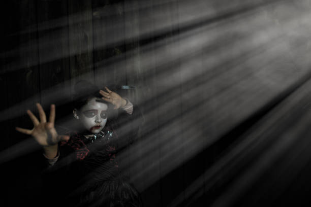 Halloween – creepy little vampir in the moonlight