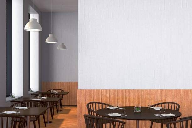 istock Modern restaurant interior with served tables and blank poster 862085966