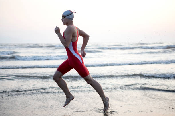 istock Youn Man Running At Beach 862097106