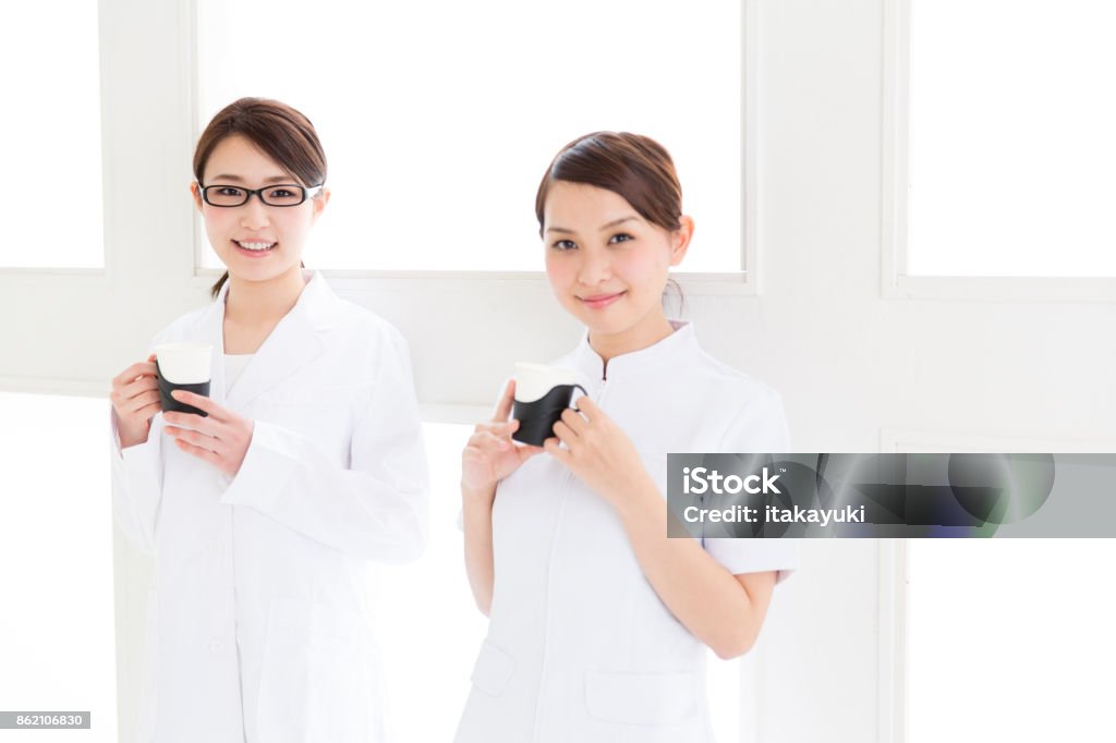 young asian doctor in hospital Adult Stock Photo