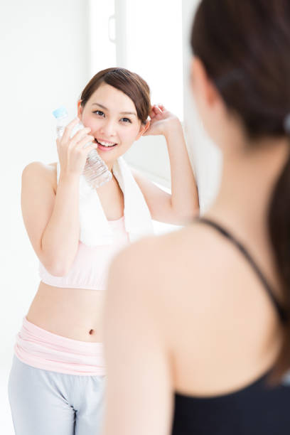 istock attractive asian woman exacising image 862107308