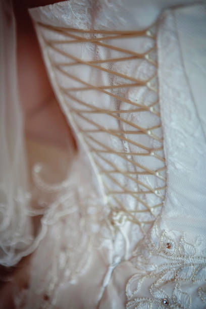 istock Lacing on a wedding dress 862110556