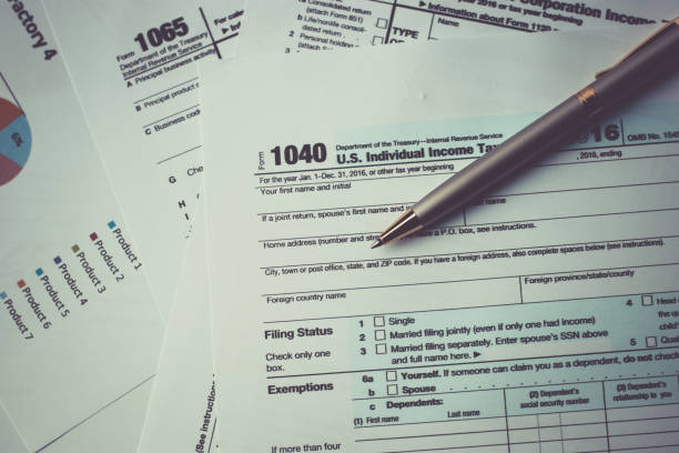 istock pen on us tax form 1040 862111404