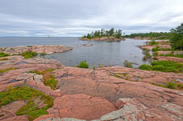 istock Looking out to Open Water on a Remote Lake Shore 862112422