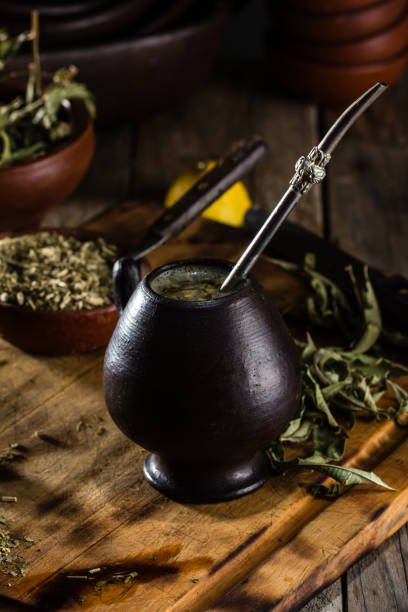 istock Latin American hot drink herb tea - Yerba mate in clay mug 862117232