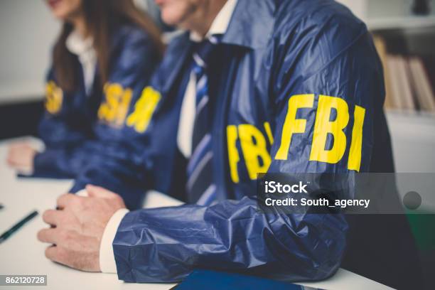 Fbi Team In Office Stock Photo - Download Image Now - FBI, Police Force, Office