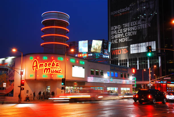 Los Angeles, CA, USA - February 14, 2014: Night traffic on Sunset Strip, famous Hustler on the right.