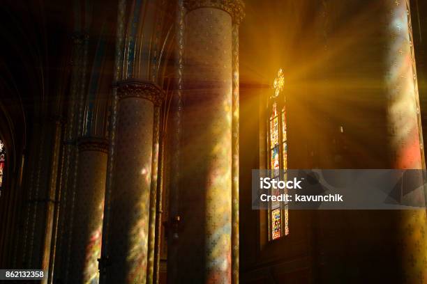 Sunlight Between The Columns In Catholic Church Stock Photo - Download Image Now - Church, Stained Glass, Catholicism