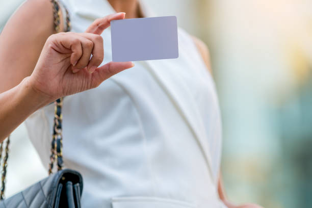 istock Businesswoman showing white empty card 862132914