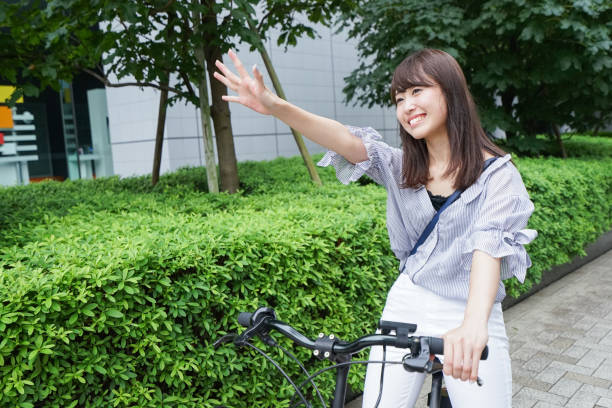 istock Woman riding bike 862136654