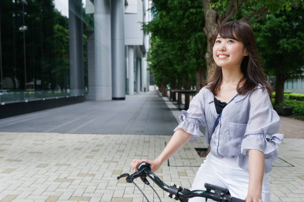 istock Woman riding bike 862136656