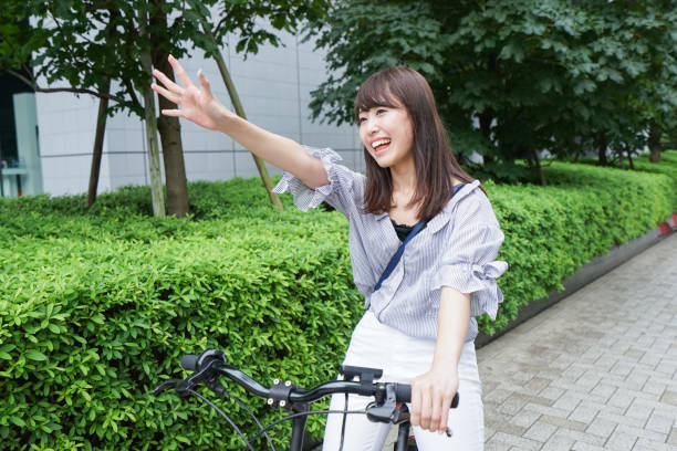 istock Woman riding bike 862136660