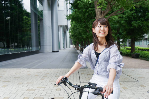 istock Woman riding bike 862136712
