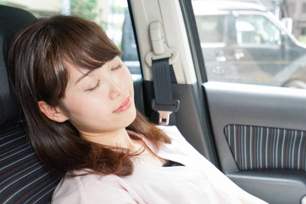 istock Woman sleeping in car 862139730