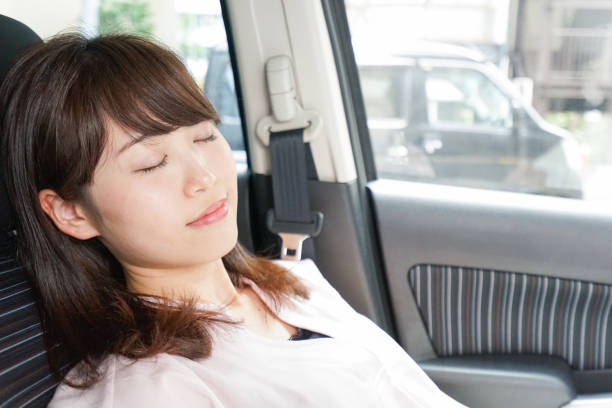 istock Woman sleeping in car 862139766